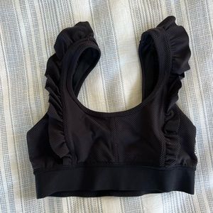 free people movement black ruffle sports bra